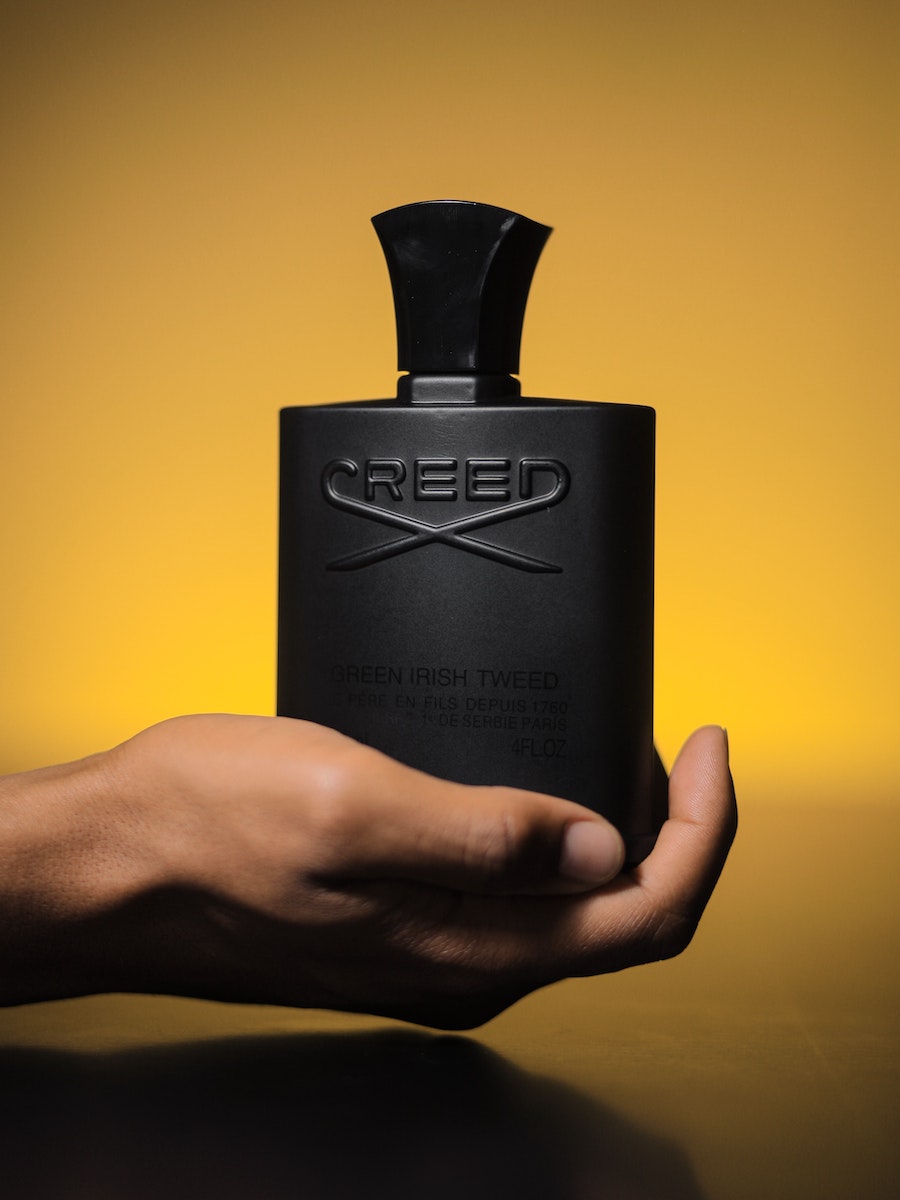 Creed Green Irish Tweed vs Aventus: Ultimate Comparison A bottle of Creed Green Irish Tweed