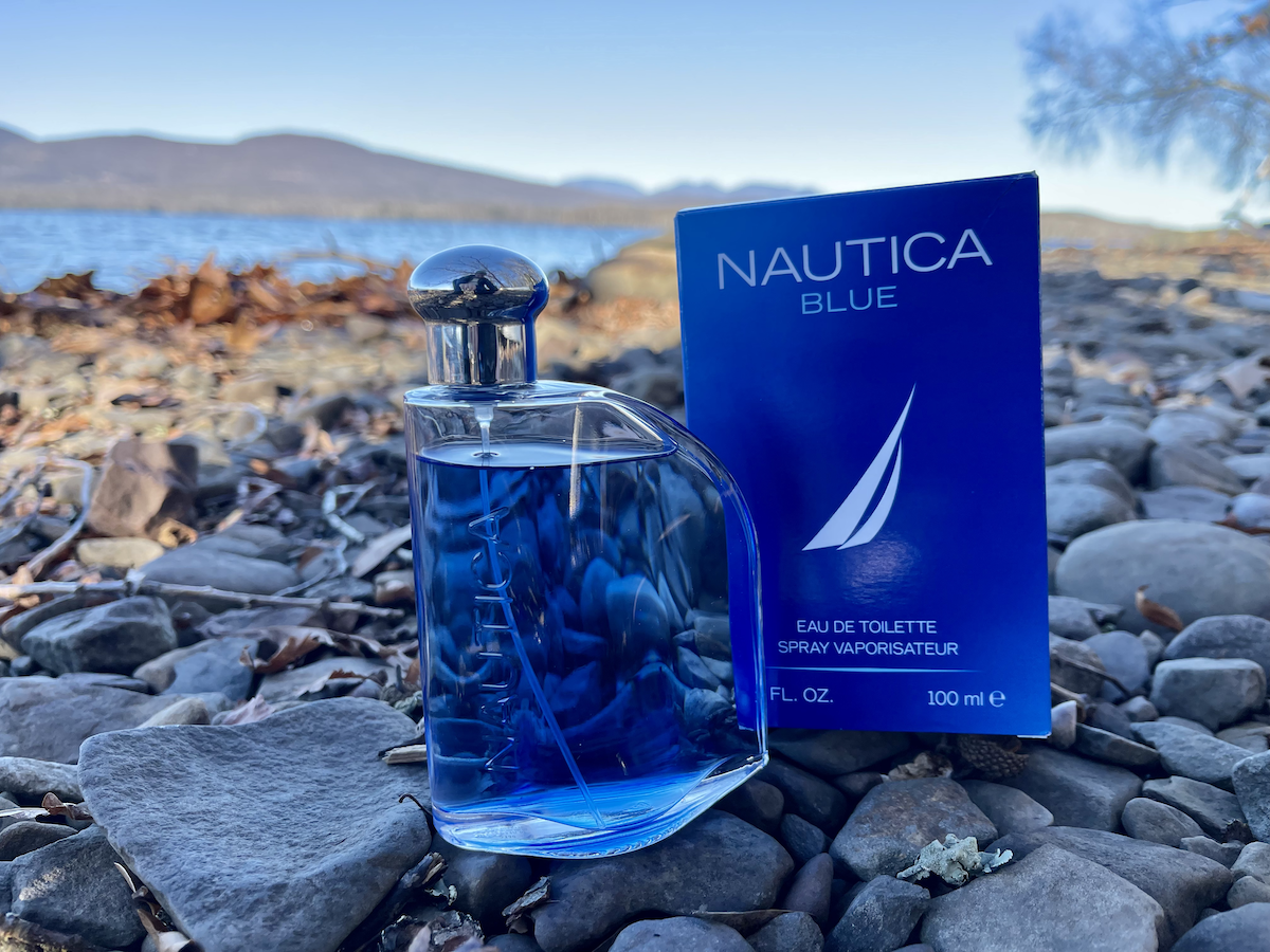 nautica blue - bottle and box on rocks